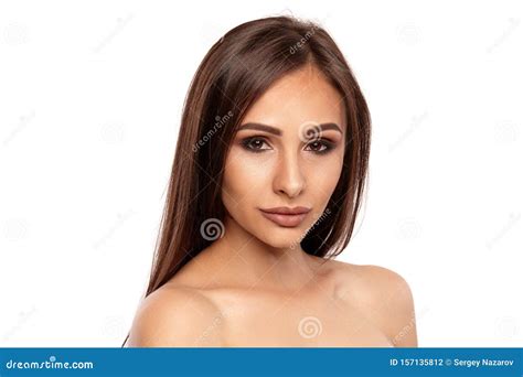 Close Up Portrait Of A Brunette Nude Model Girl With Professional Evening Make Up And Plump Lips