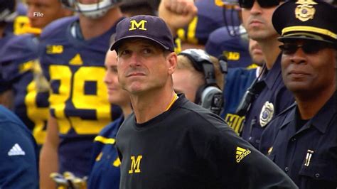 Michigan coach suspended amid college football sign stealing scandal ...