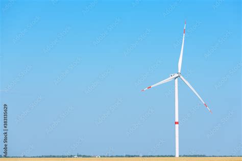 Wind turbines on sky background. Environment and renewable energy ...