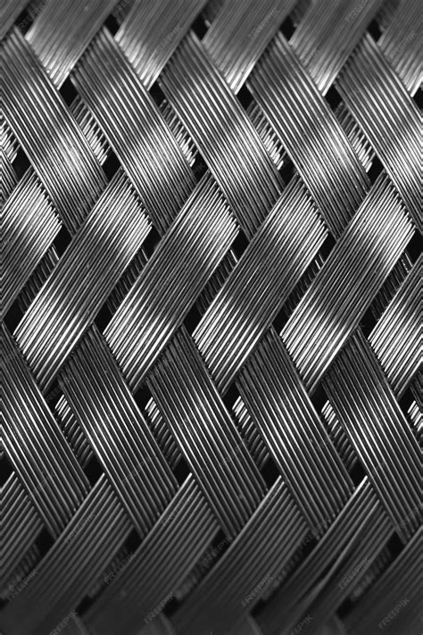 Premium Photo | Metal wire braiding in macro. detailed steel texture ...