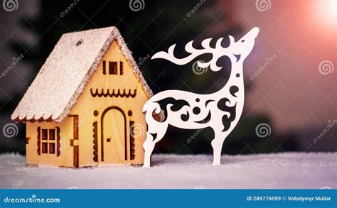 Carved Out of Wood Reindeer and a House for Decorating a Christmas Tree ...