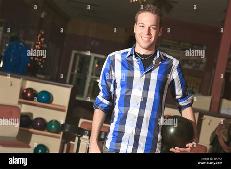 A bowling player in the alley Stock Photo - Alamy