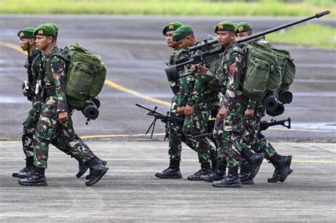 Military urged to cut presence, use of force in Papua - Politics - The ...