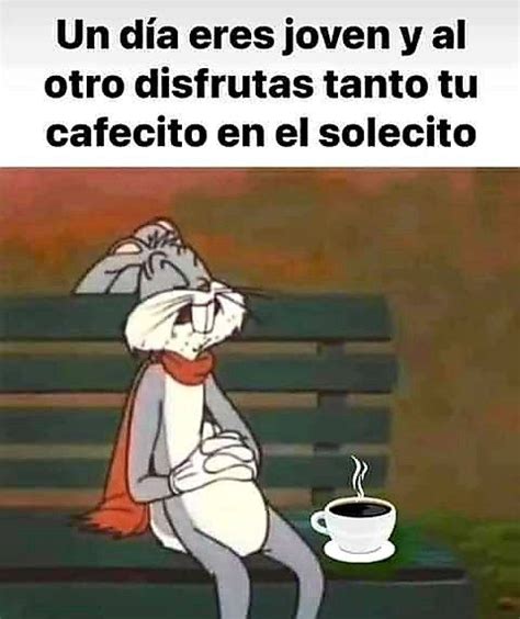 A Cartoon Rabbit Sitting On Top Of A Bench Next To A Cup Of Coffee