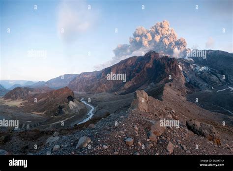 Ash cloud from Eyjafjallajoekull volcano above a glacier and Þórsmoerk ...