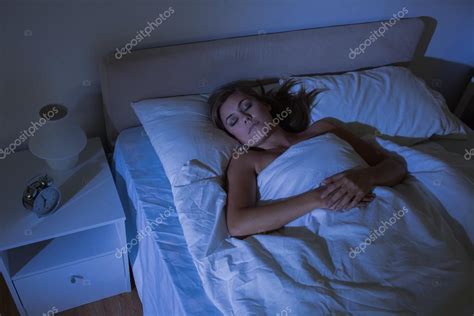 Calm woman sleeping at night — Stock Photo © Wavebreakmedia #24093283