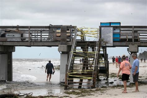 Flood damage: Naples takes stock of their homes, belongings after ...