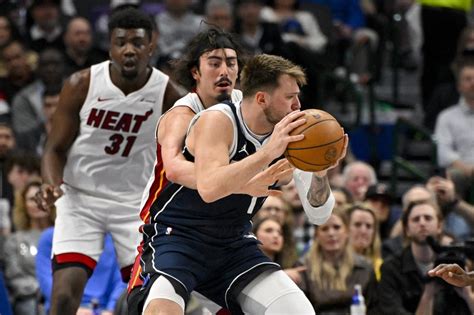 Luka Doncic S 35 Point Triple Double Helps Mavs Past Heat