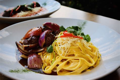 FETTUCCINE A LA HUANCAÍNA CON LOMO SALTADO Main Menu Embarcadero 41