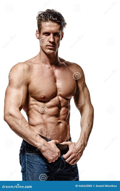 Strong Athletic Man Showing Muscular Body And Sixpack Abs Stock Photo