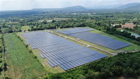 Solar energy farm. Aerial view of a solar farm in Asia. Stock Photo ...