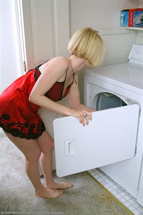 Blonde MILF Gets Hot Doing Laundry So She Strips Naked