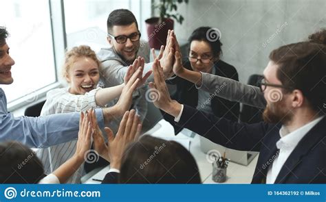 Motivated Business Team Giving Group High Five Stock Photo Image Of