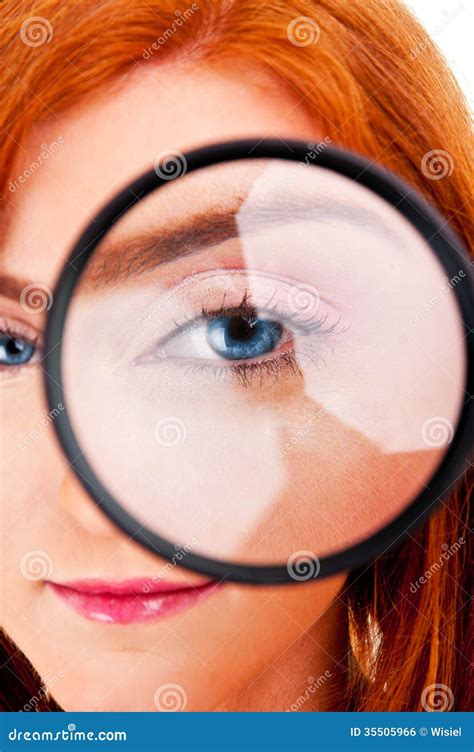 Beautiful Woman Looking Through A Magnifying Glass Stock Photo Image