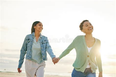 Love Beach And Lesbian Couple Holding Hands Walking Together On Sand And Sunset Holiday