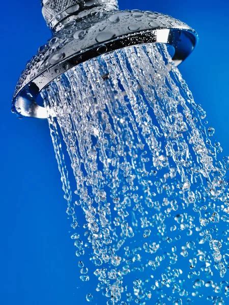 Water Flowing Of Shower Head Stock Photo By ©londondeposit 33840021