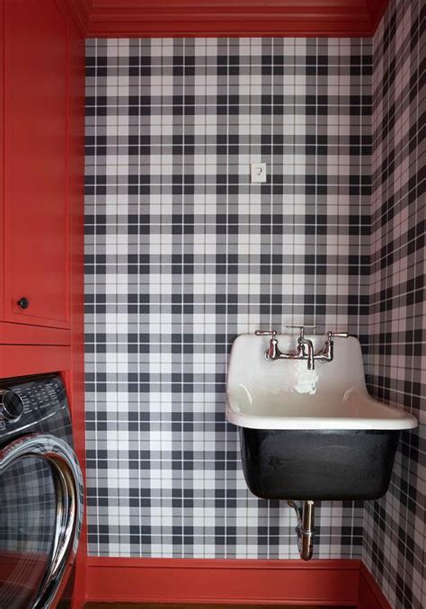 Red Laundry Room Cabinets With Black Floor Tiles Transitional