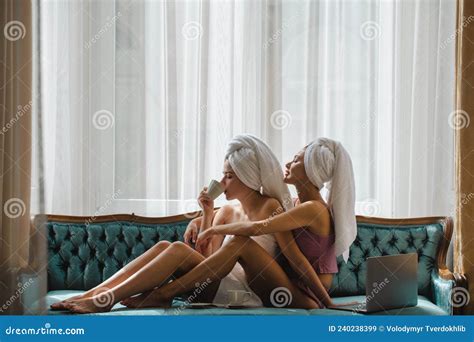 Loving Lesbian Couple Girls Drinking Coffee Embrace On Bed Girlfriends In Love At Home Spend