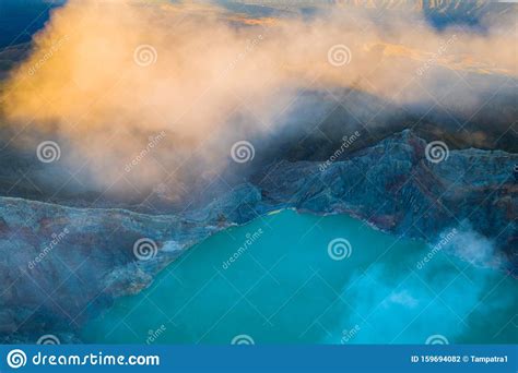 Aerial View Of Rock Cliff At Kawah Ijen Volcano With Turquoise Sulfur