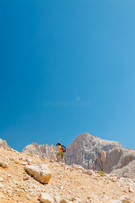 Summer Camp Boy With A Backpack A Boy With A Backpack Walks Along A