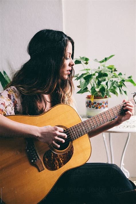 Beautiful Hippie Woman Playing Guitar By Stocksy Contributor Kkgas Stocksy