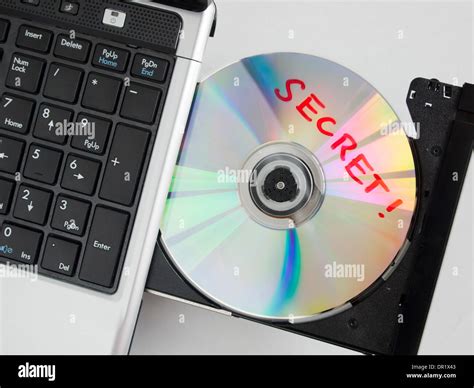 CD ROM In The CD Drive Of A Labtop Computer Stock Photo Alamy