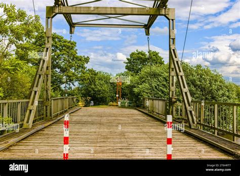 typical bascule bridge over a canal Stock Photo - Alamy