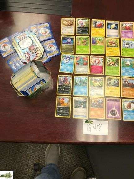 POKEMON CARDS & TIN - Michener Allen Auctioneering Ltd