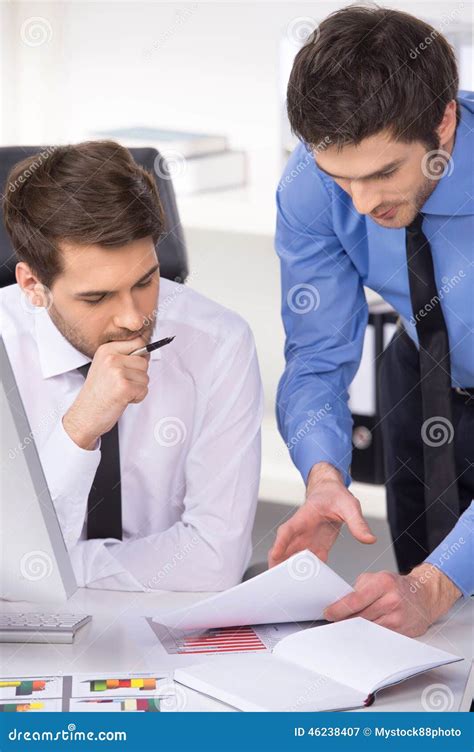 Two Businessmen Having Discussion In Office Stock Image Image Of