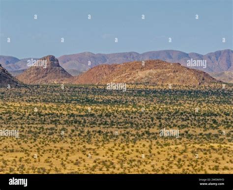 Aerial View Of A Desert Landscape With Red Granite Hills Around The