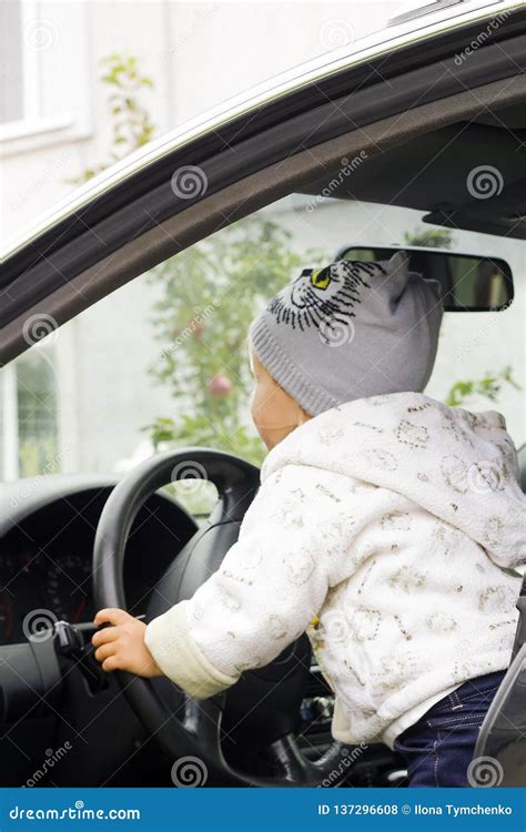 Little Girl Driving Car, Soft Focus Stock Photo - Image of person, insurance: 137296608