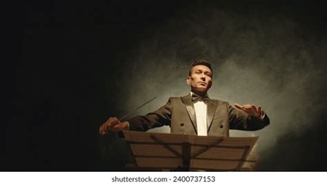 Asian Symphony Orchestra Conductor Wearing Suit Stock Photo 2400737153 ...