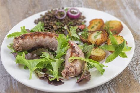 France Grilled Toulouse Sausage with Roasted Potatoaes and Salad and ...