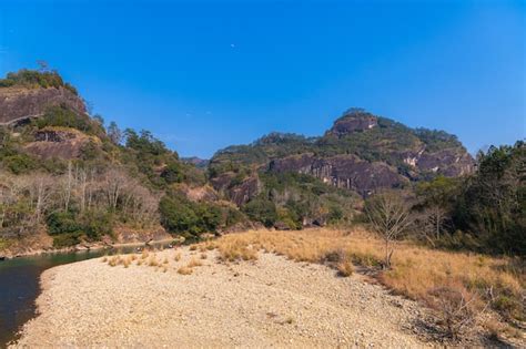 Premium Photo Scenic Picture Of The River Tall Strange Shaped Rocks