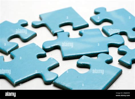 Blue Puzzle Pieces On White Background Stock Photo Alamy