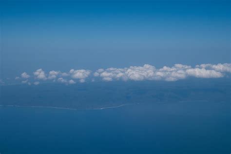 blue sky and clouds on plane 10326543 Stock Photo at Vecteezy