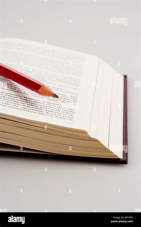 Pencil on book Stock Photo - Alamy