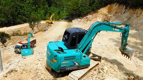 Kobelco Sk Mini Excavator Digging Limestone Hill Youtube