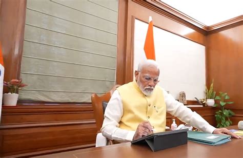 Pm Modi Signs First File For Farmers Welfare