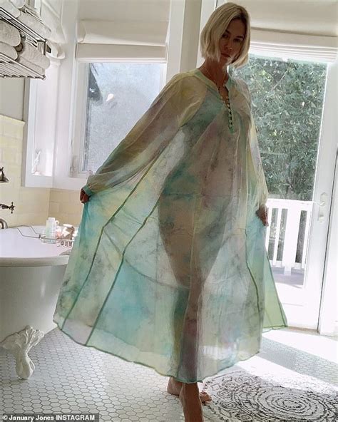 January Jones Frolics Outside In The Extreme La Summer Heat In Another Scintillating Bikini