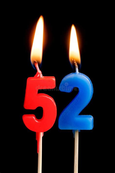 Burning Candles In The Form Of Fifty Two Numbers Dates For Cake