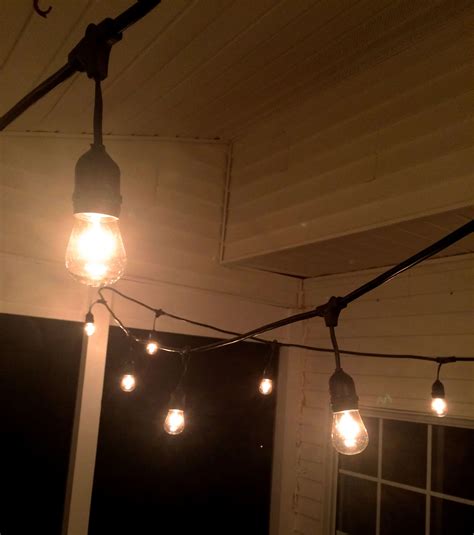 The Easiest Way to Hang String Lights on a Screened Porch