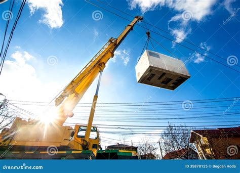 Mobile Crane Operating By Lifting An Electric Generator Royalty Free