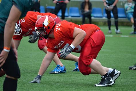 Unlock the Weighty Secrets: How Much Does a Football Helmet Weigh?