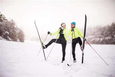 Senior Couple Cross Country Skiing Stock Image Image Of Foggy Race