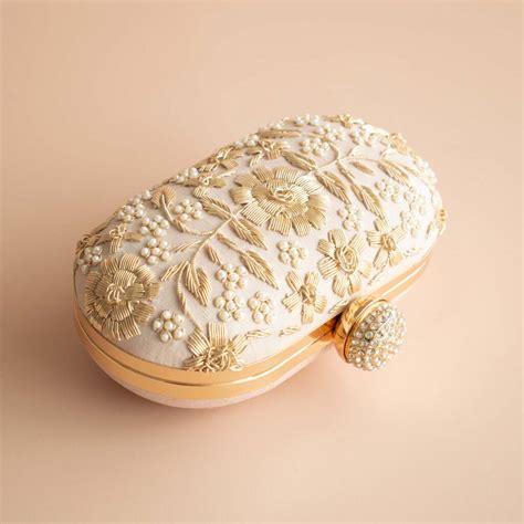 Asha Nude Pink Oval Clutch By Atiya Choudhury