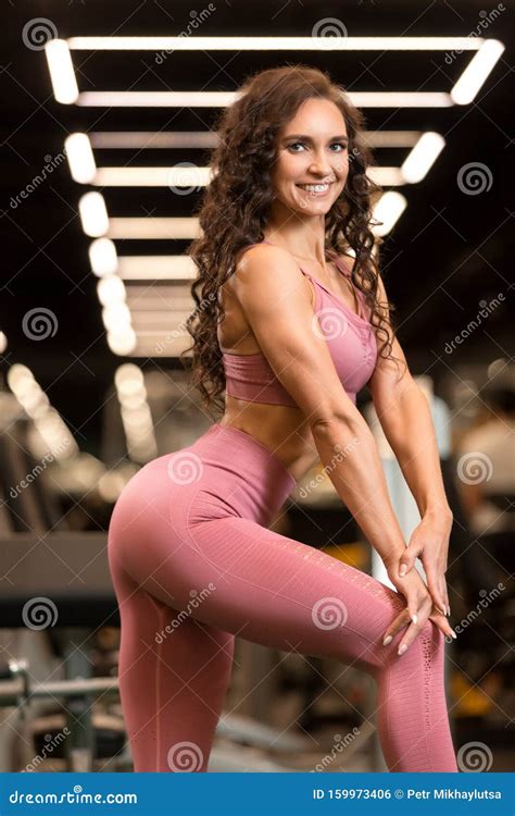 Fitness Brunette Woman Is Standing With Ball In The Gym After Exercises Stock Photo Image Of