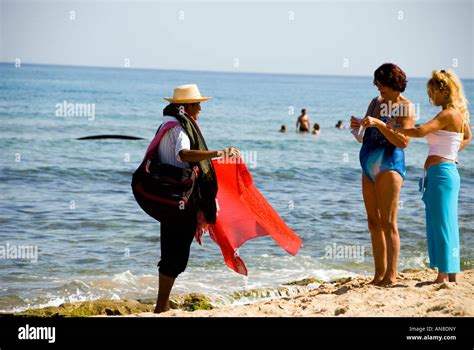 two women shopping on the beach, Tabarka, Tunisia Stock Photo - Alamy