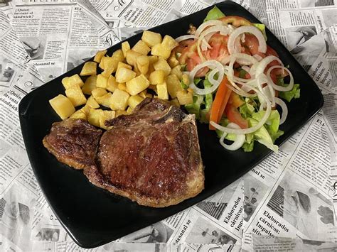 9 Chuleta De Ternera Patatas Y Ensalada