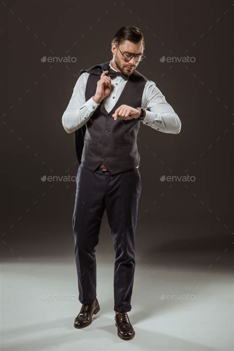 Full Length View Of Stylish Businessman In Bow Tie And Eyeglasses